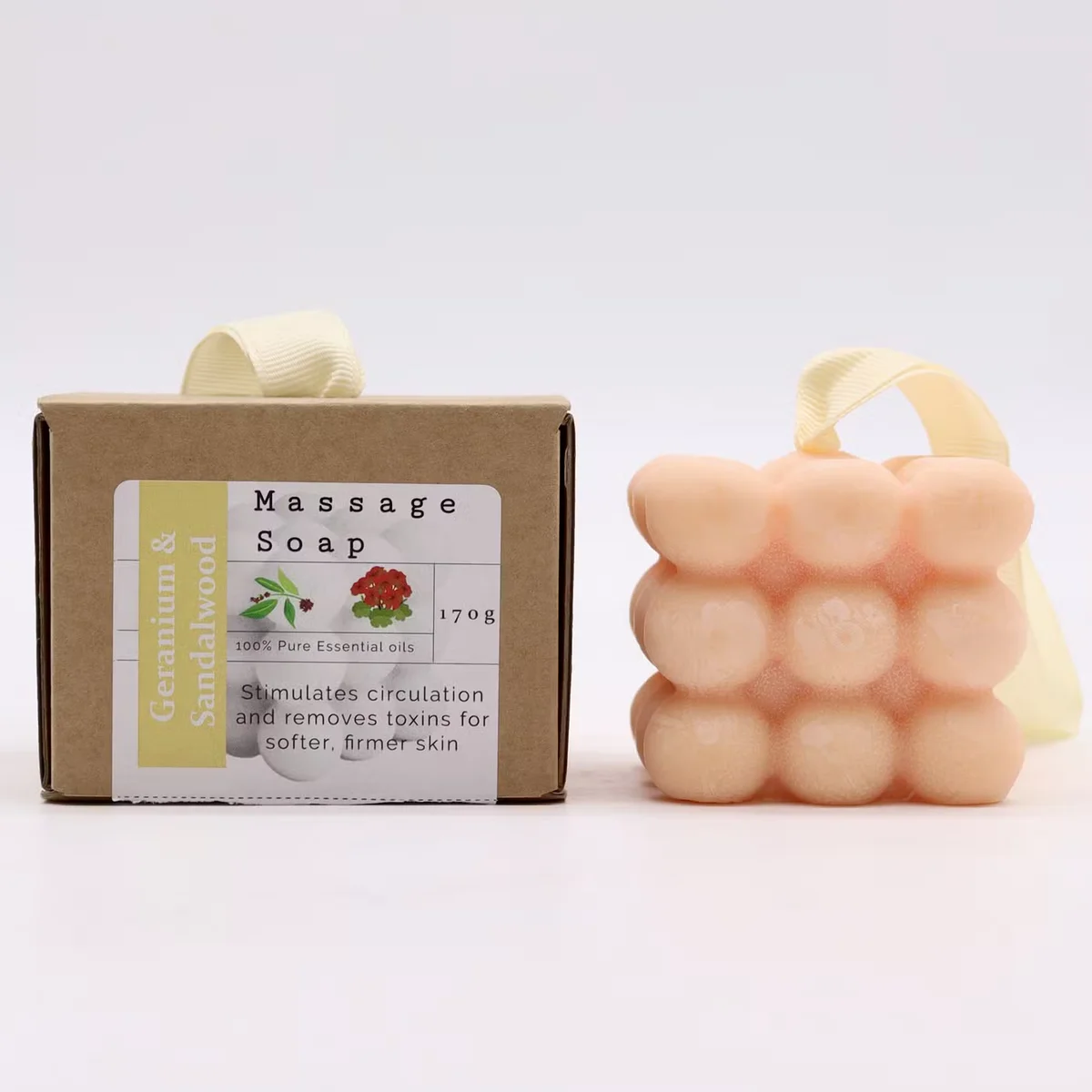 Boxed soap featuring geranium and sandalwood massage soaps in individual packaging.