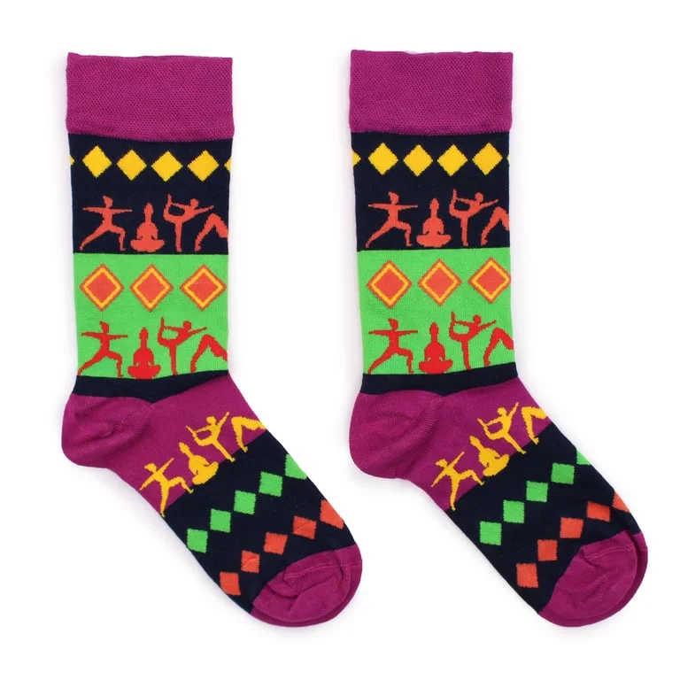 Pair of bamboo yoga socks laid flat, showing soft knitted material.