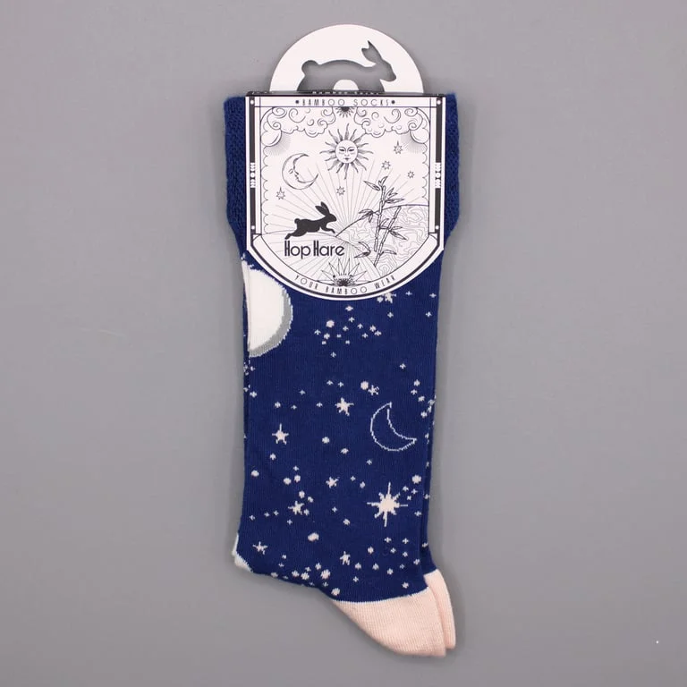Folded pair of Hop Hare bamboo socks in moon walk style, showing the product’s clear design.
