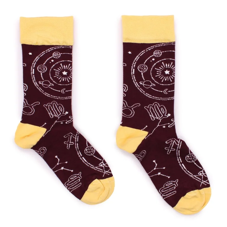 Pair of bamboo socks M/L in Zodiac brand, textured mid‑length socks shown folded on smooth surface.
