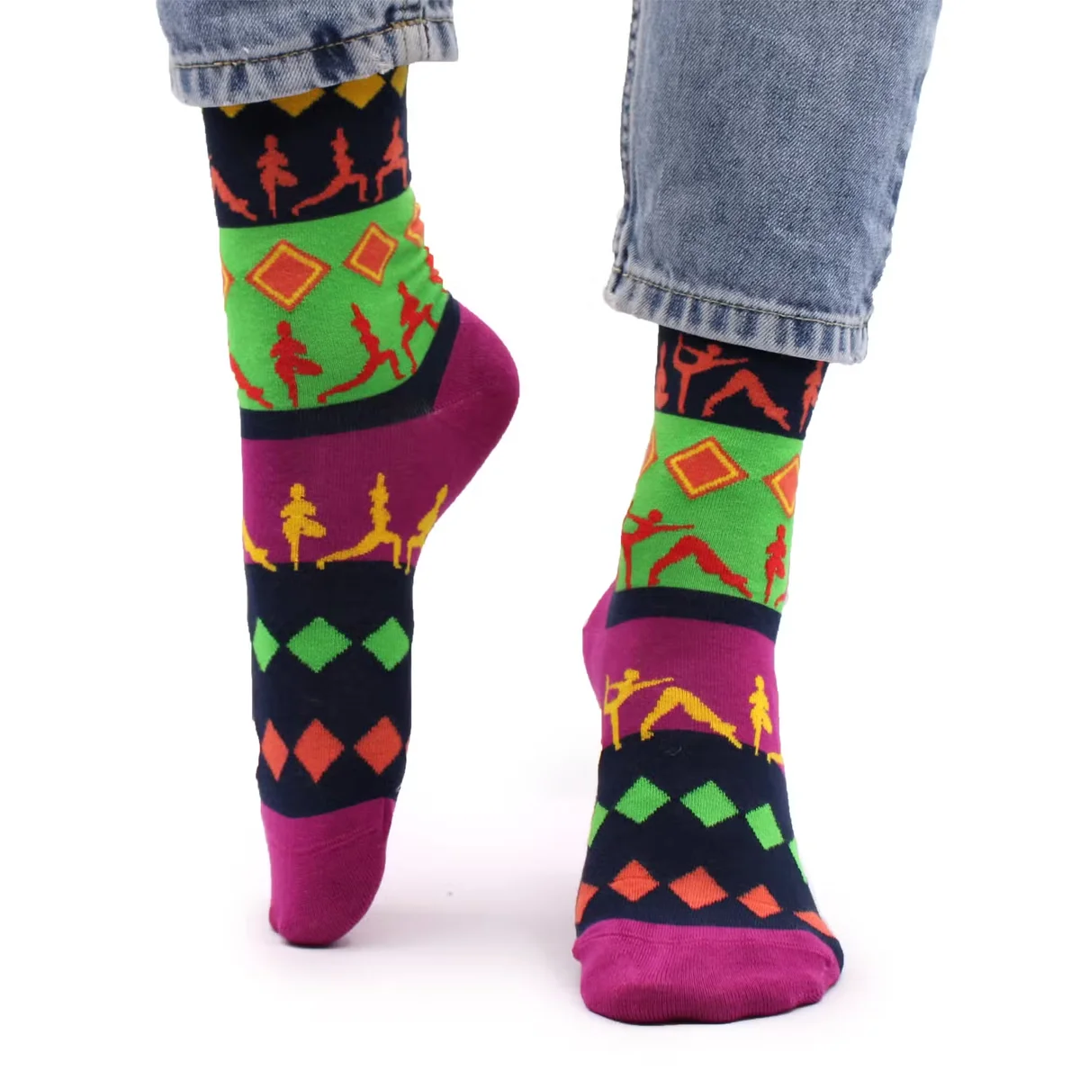 Pair of Hop Hare S/M non-slip yoga socks with yoga pose designs made from bamboo fabric displayed on white background