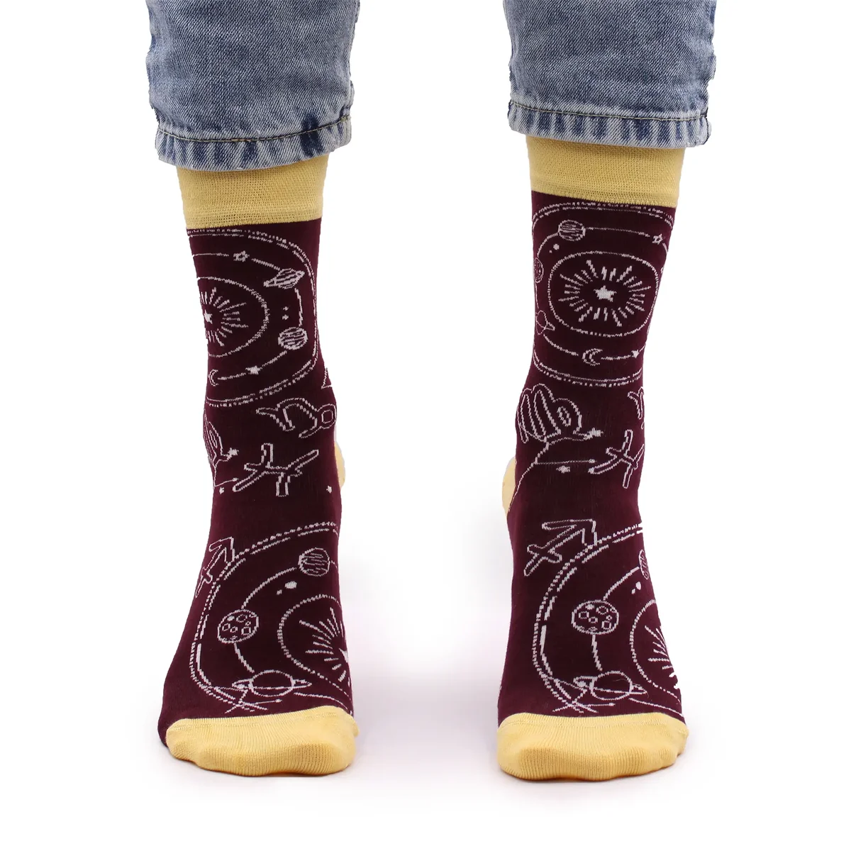 Pair of Hop Hare S/M bamboo zodiac socks in soft fabric with subtle zodiac design on a white background