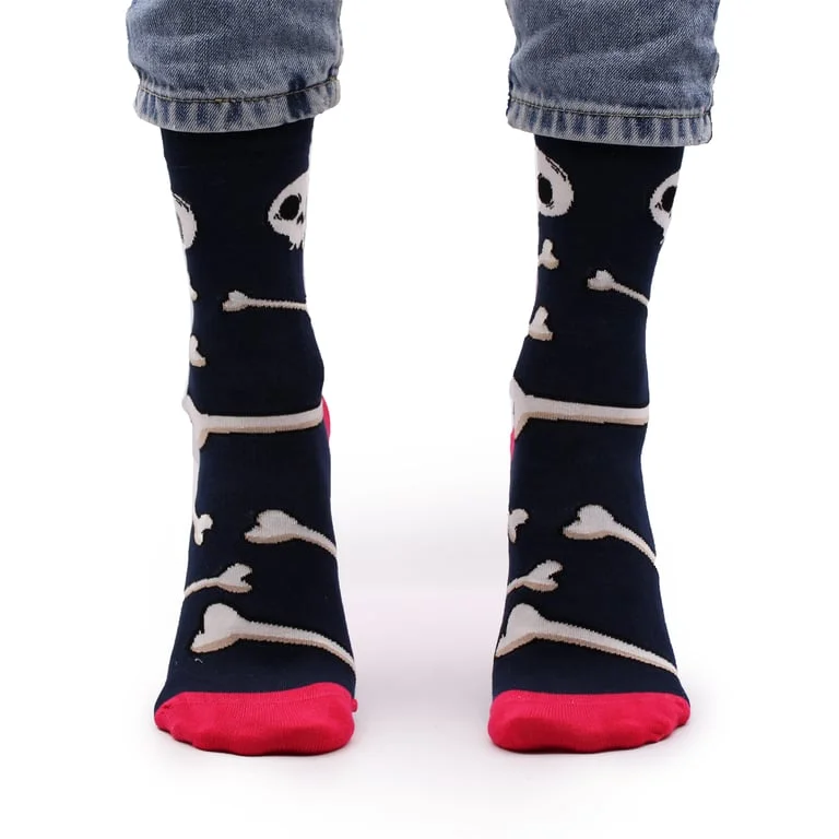 Small medium bamboo socks with skulls and bones design, shown on foot or folded.