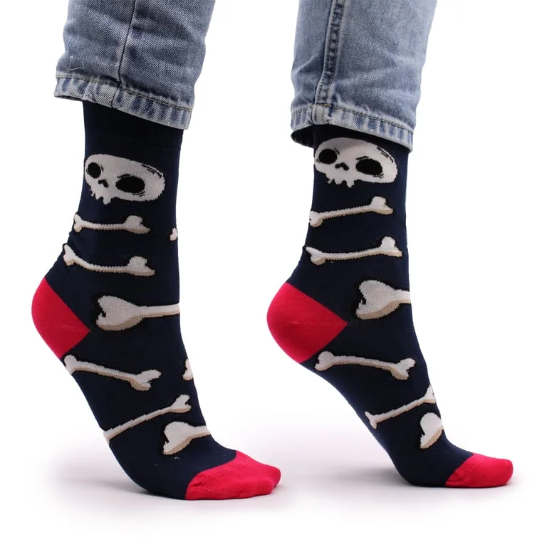 Pair of stylish bamboo socks in skulls and bones pattern, showing cropped view of colourful skull and bone motifs.