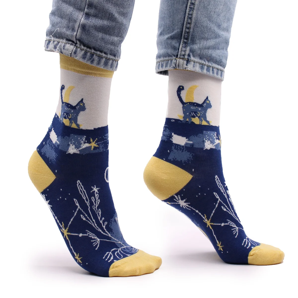 Pair of Hop Hare bamboo socks in size S/M featuring a midnight cat design on a dark background