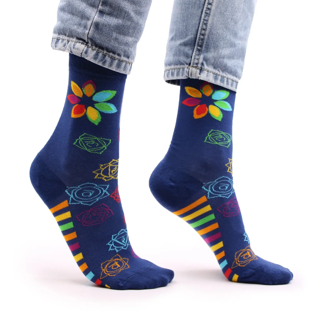 Pair of Hop Hare S/M bamboo rainbow chakra socks with vibrant multicolour stripes on a white background