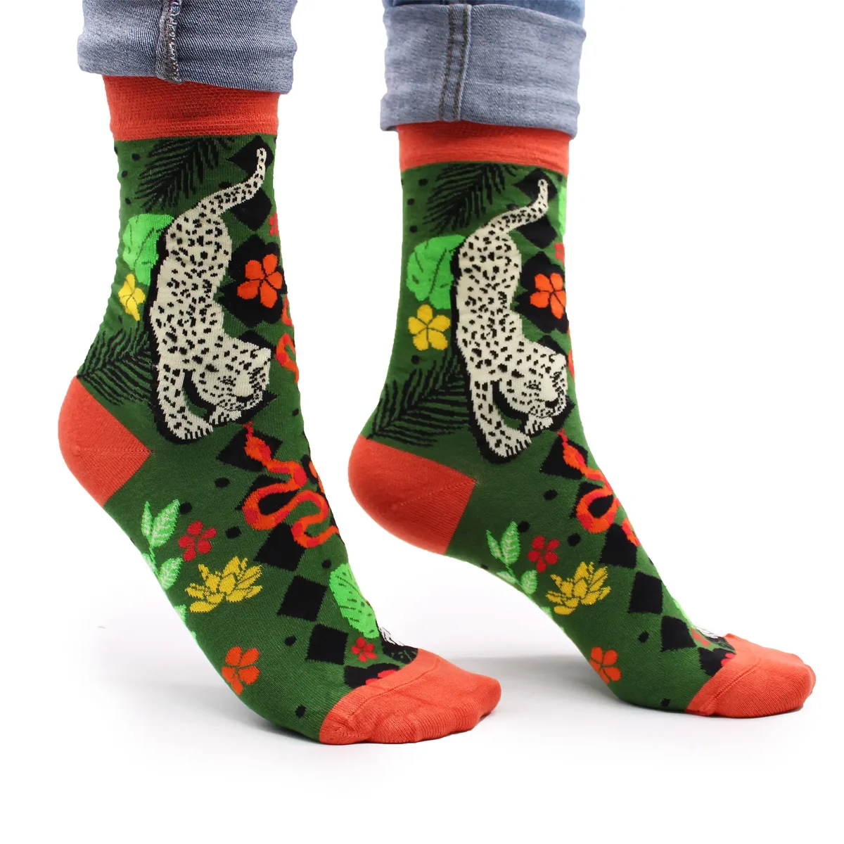 Pair of S/M Hop Hare bamboo socks in Bali Jungle design featuring green tropical leaf patterns on soft fabric