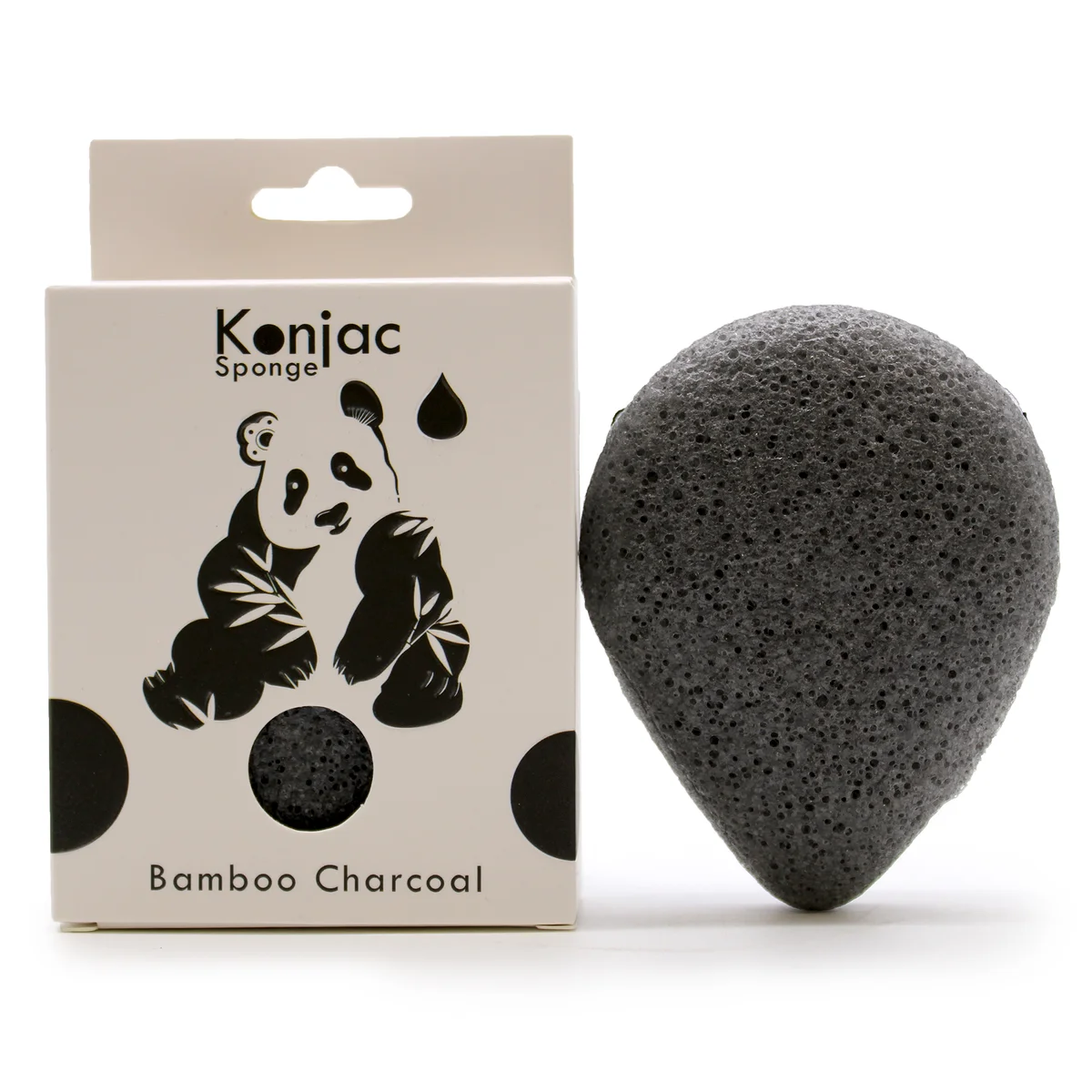 Teardrop-shaped bamboo charcoal face sponge in black with textured surface for antibacterial skincare use