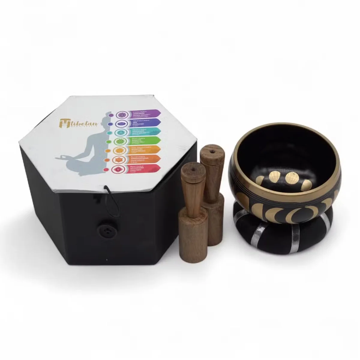 Black moon phase singing bowls set on display, featuring a 10.7cm singing bowl in the foreground.