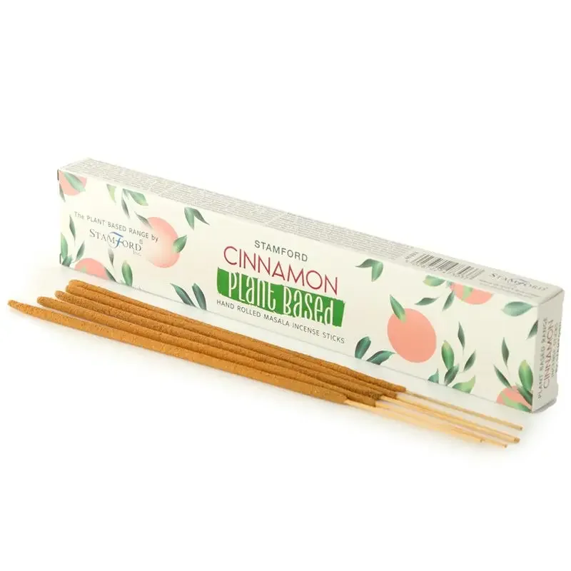 Plant based incense sticks, cinnamon scent, bundled on a flat surface.