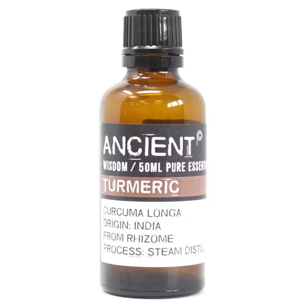 Small amber glass bottle of turmeric essential oil 50ml highlighting turmeric oil benefits for wellness and skincare use