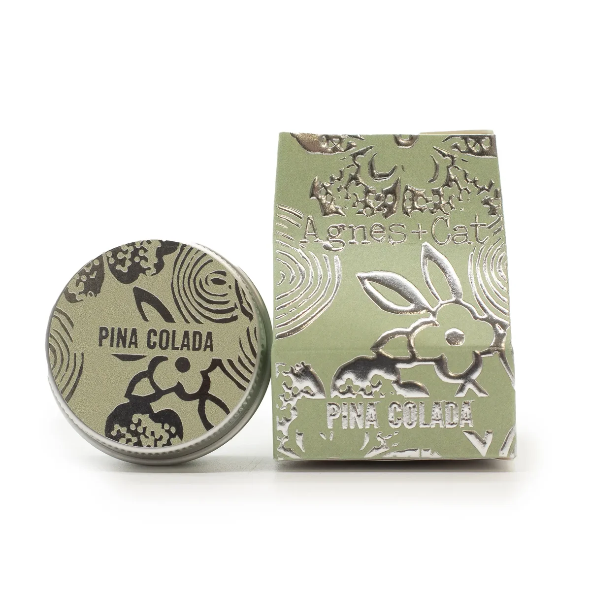 Agnes + Cat lip balm in Pinacolada flavor with yellow and white packaging on a white background