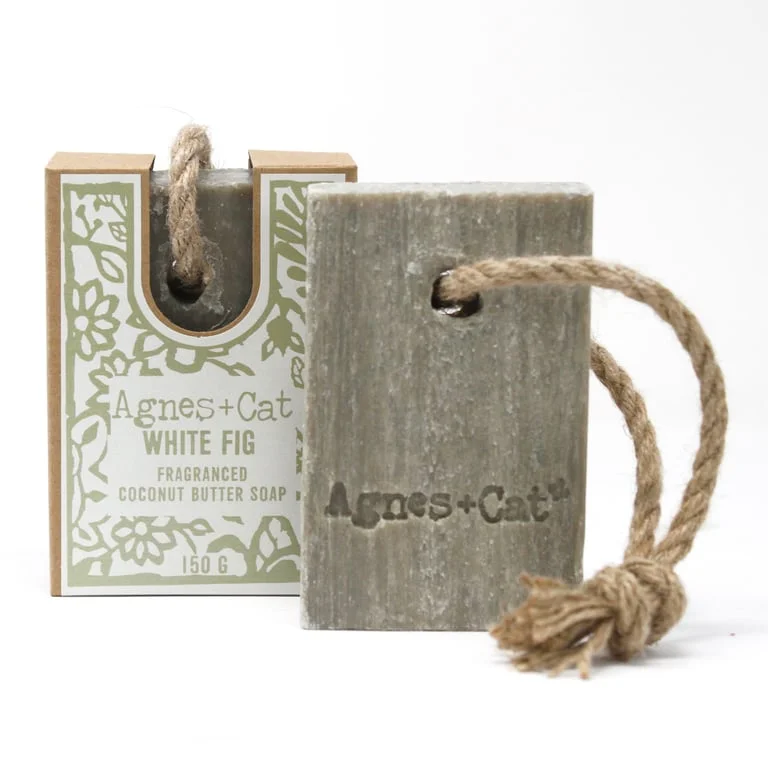 Soap on a rope with a white fig scent, displayed on a natural rope, lightly wrapped.