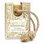 Natural soap on a rope, a Moroccan roll wrapped in string, displayed in a rustic setting.