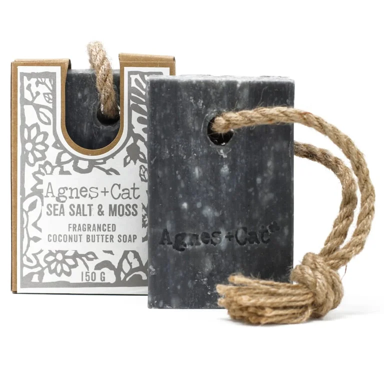Soap on a rope, sea salt and moss soap bar resting on a frayed cord
