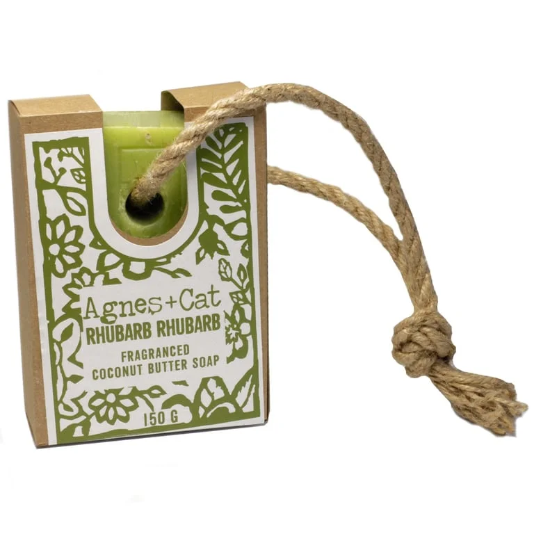 Bath soap with rope hanging, featuring RHUBARB RHUBARB branding.