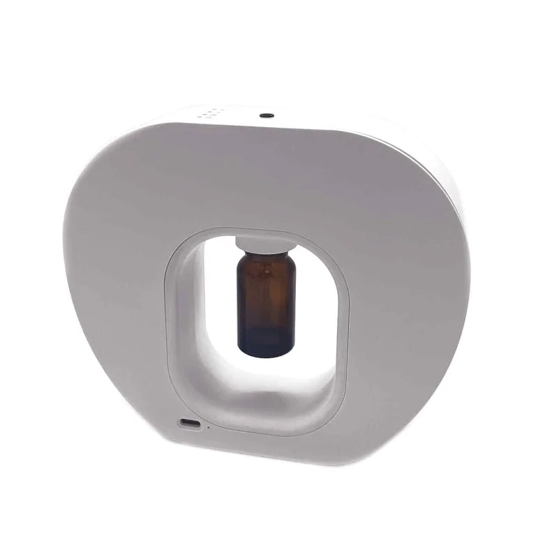 Compact dry aromatherapy diffuser with USB‑C port, no water needed.