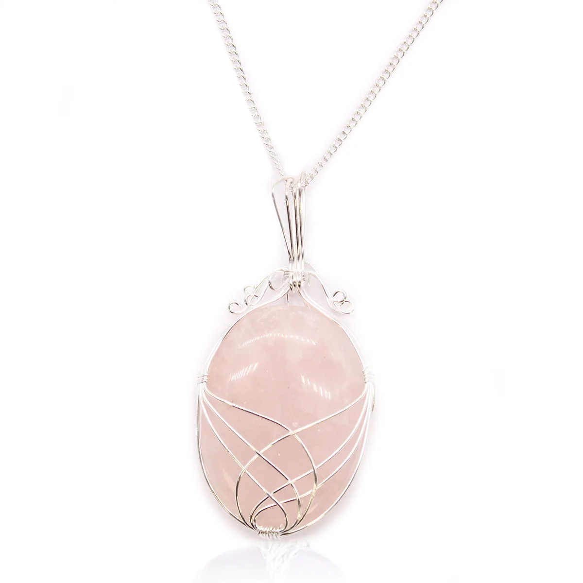 Close-up of swirl wrapped rose quartz pendant on a silver chain, gemstone necklace UK style and design