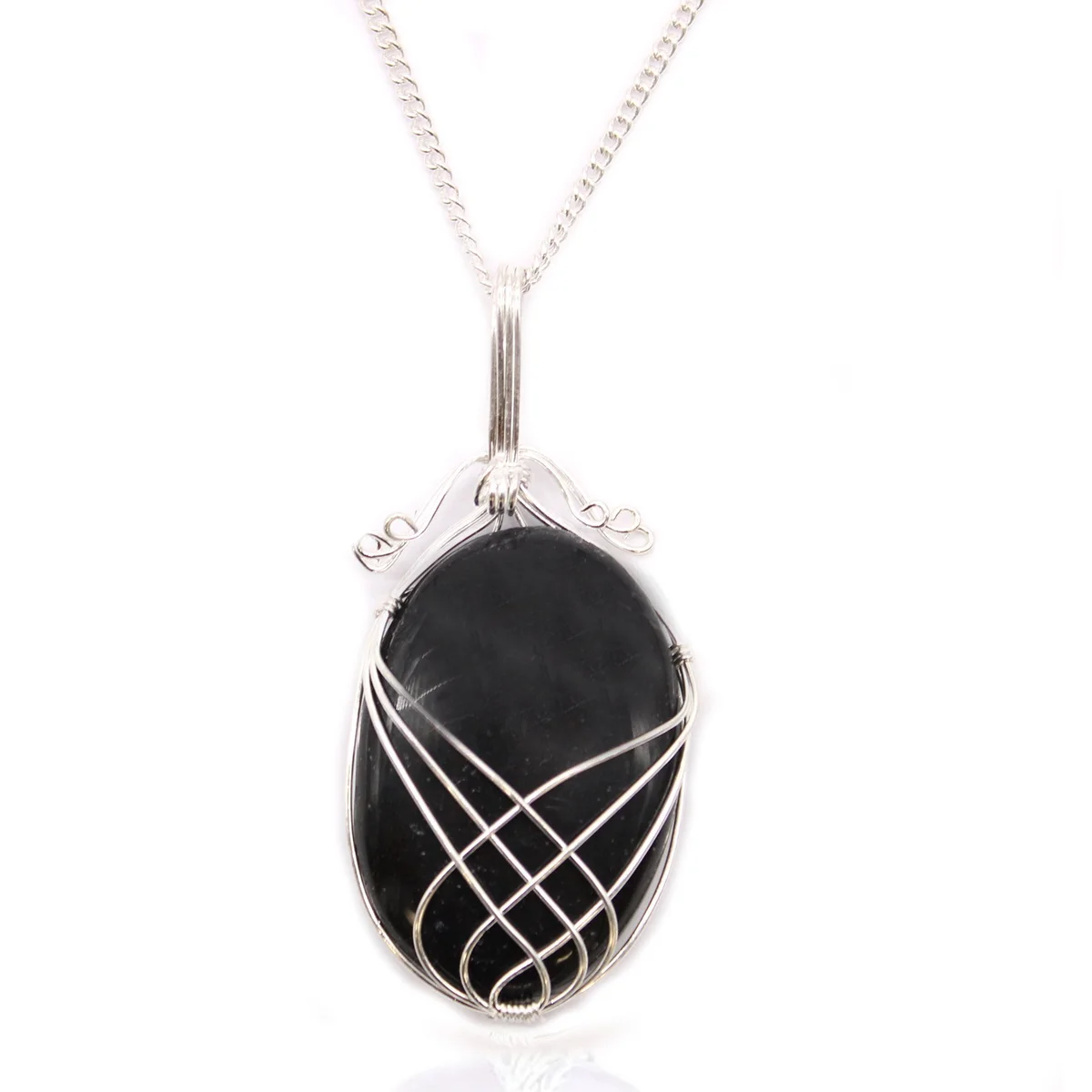 Swirl wrapped black onyx necklace with polished black gemstone pendant on a silver chain against white background