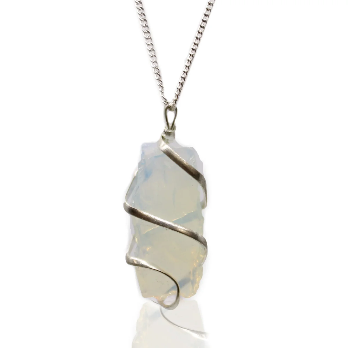 Close-up of a cascade wrapped gemstone necklace featuring rough opalite stones on a delicate chain