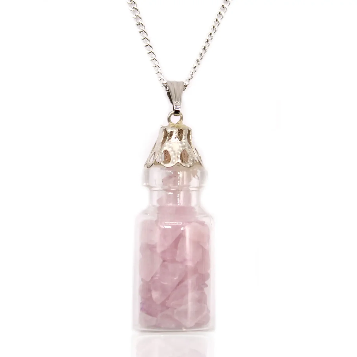 Bottled gemstones necklace featuring a clear glass bottle filled with rose quartz stones on a silver chain