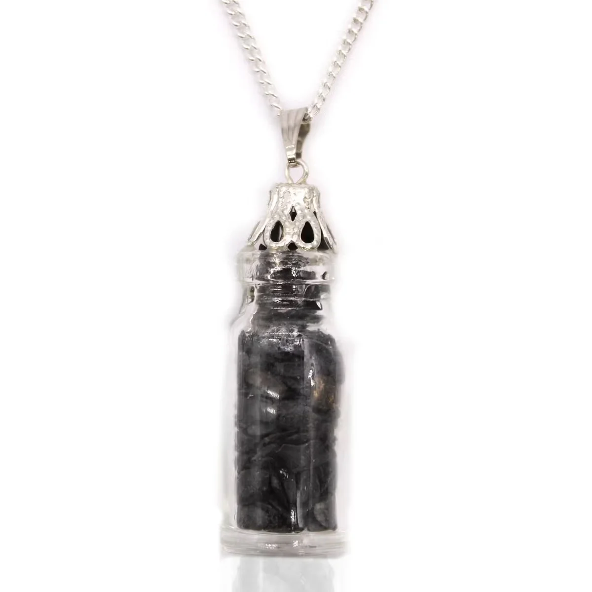 Close-up of black onyx bottled gemstones necklace, elegant gemstone jewellery UK accessory on white background