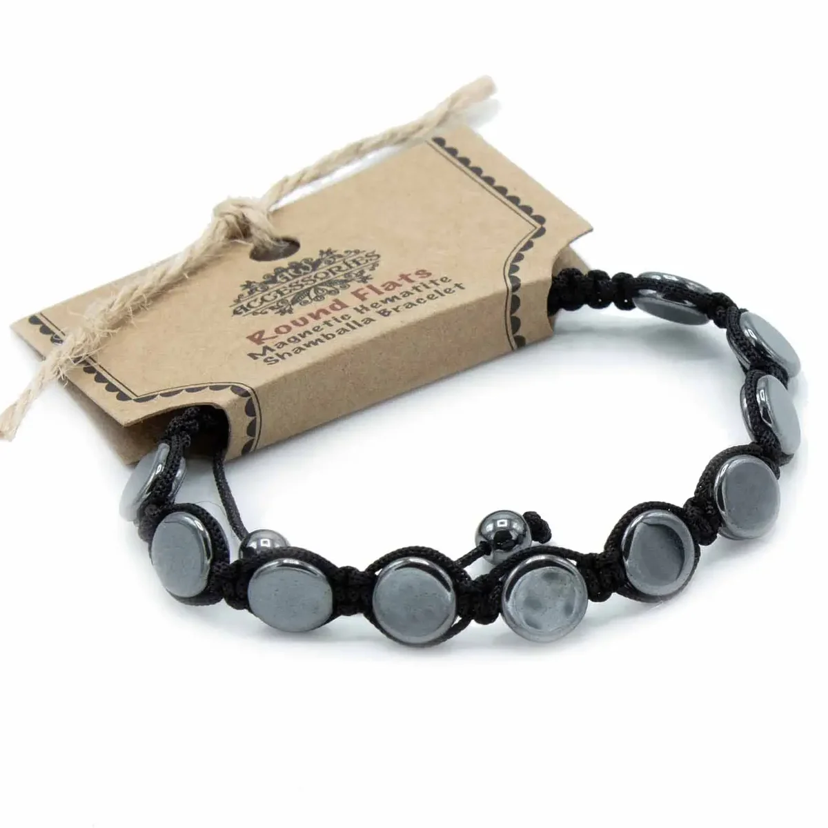 Magnetic hematite shamballa bracelet with round flat beads on a white background