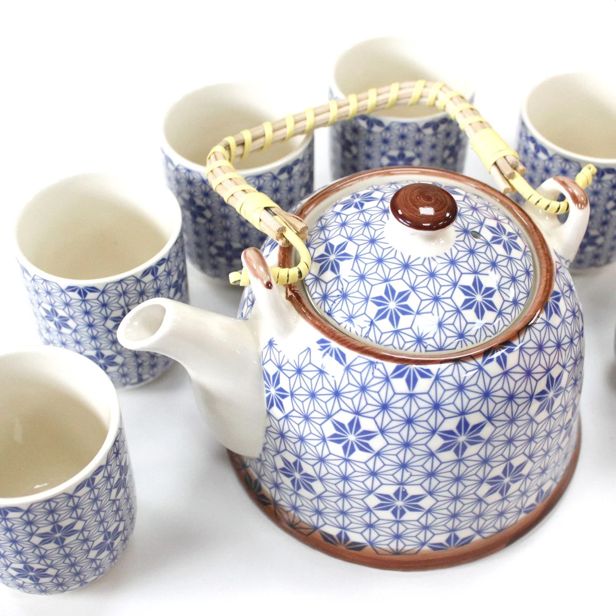 Blue star herbal teapot set featuring a teapot and matching cups designed for brewing herbal tea