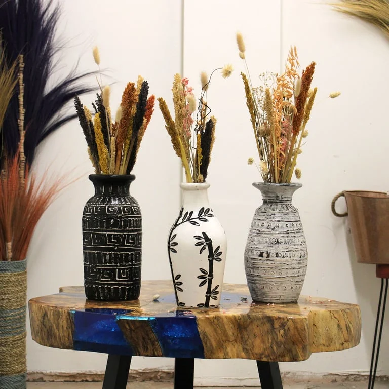 Natural straight vase with bamboo motif.