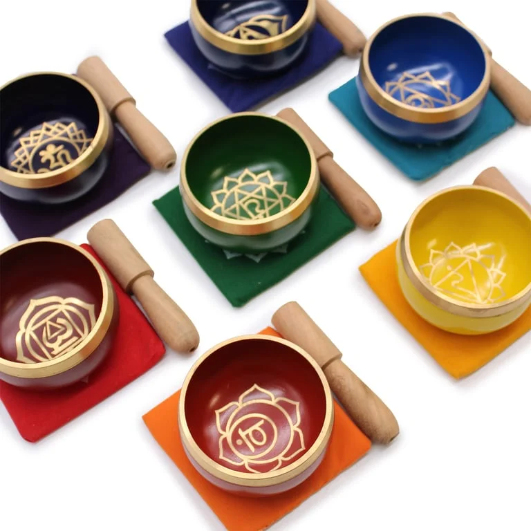 Chakra meditation bowl set gift featuring a pyramid-shaped singing bowl