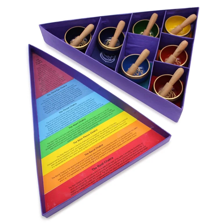 Chakra pyramid singing bowls displayed in a gift set.