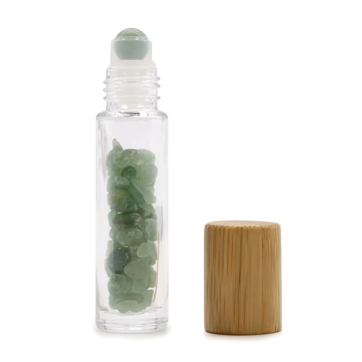 Aventurine oil roller bottle with wooden cap, green gemstone, clear glass filler and sleek design.