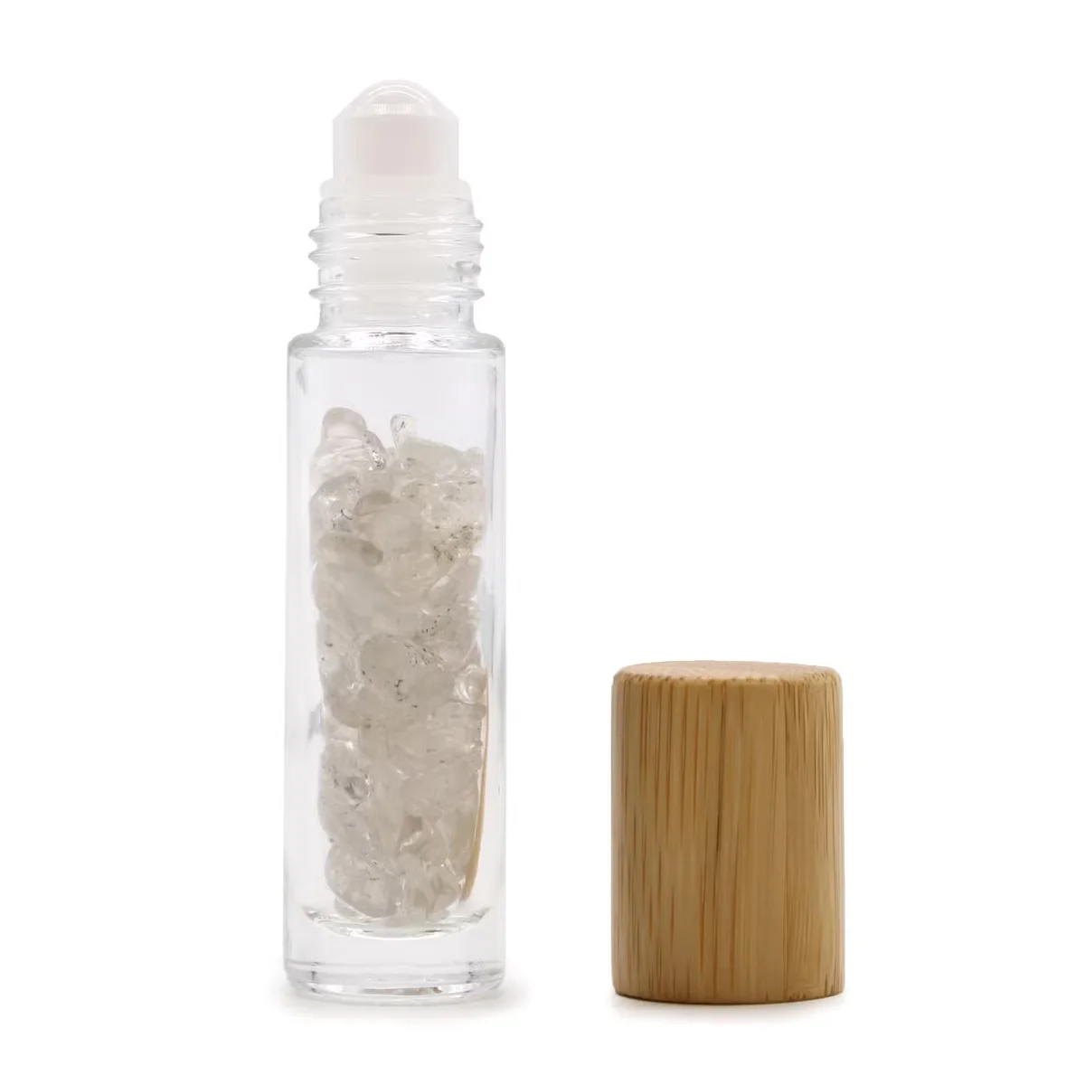 Wooden cap roller bottle with rock quartz gemstone essential oil)