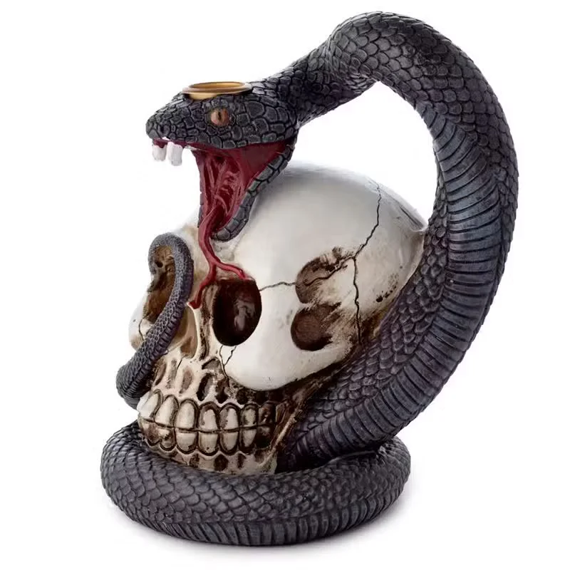 Decorative incense burner shaped like a skull with a coiled snake, designed for backflow incense cones, shown from side angle