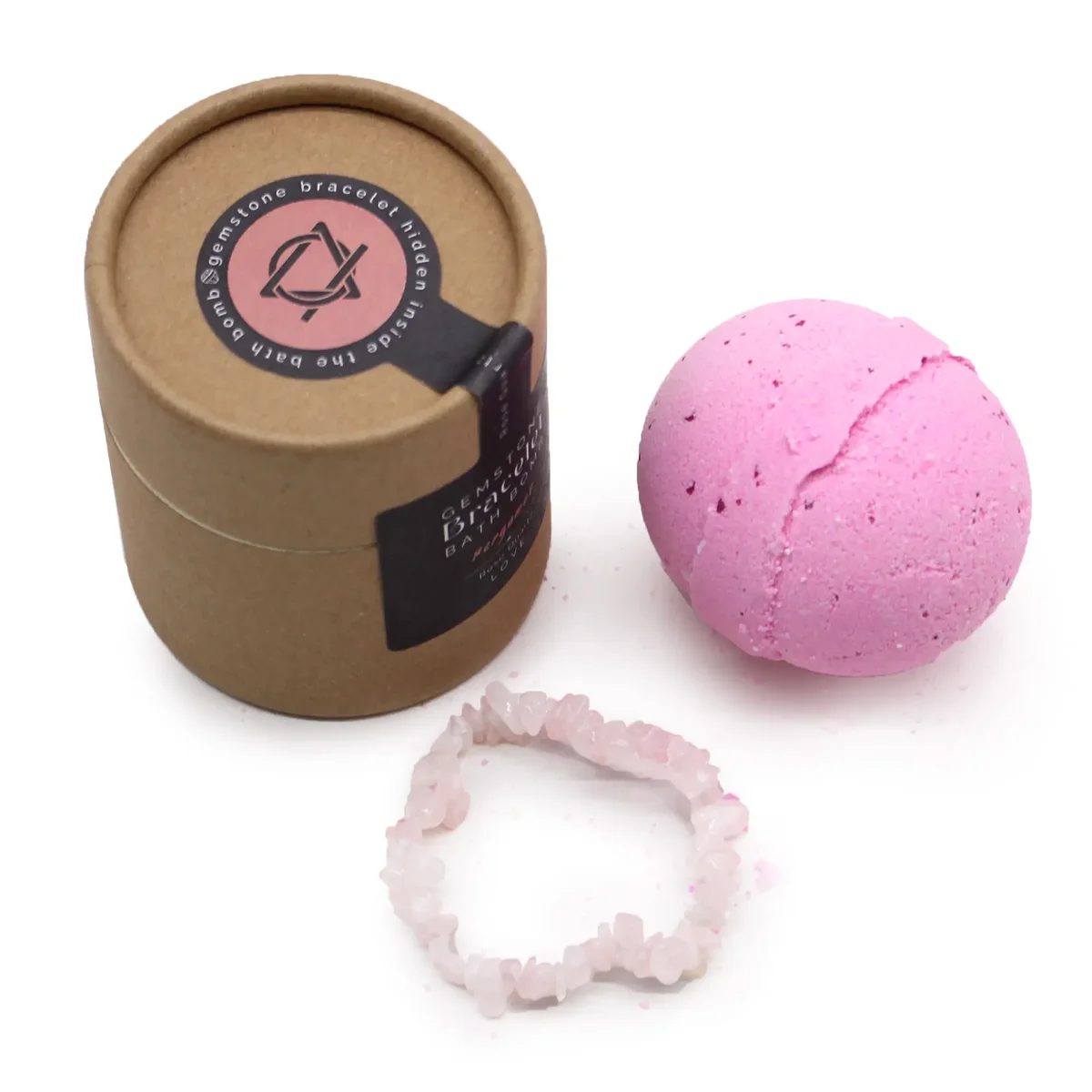 Rose quartz gem bracelet bath bomb with shimmering quartz crystals, ready to dissolve in a relaxing bath.