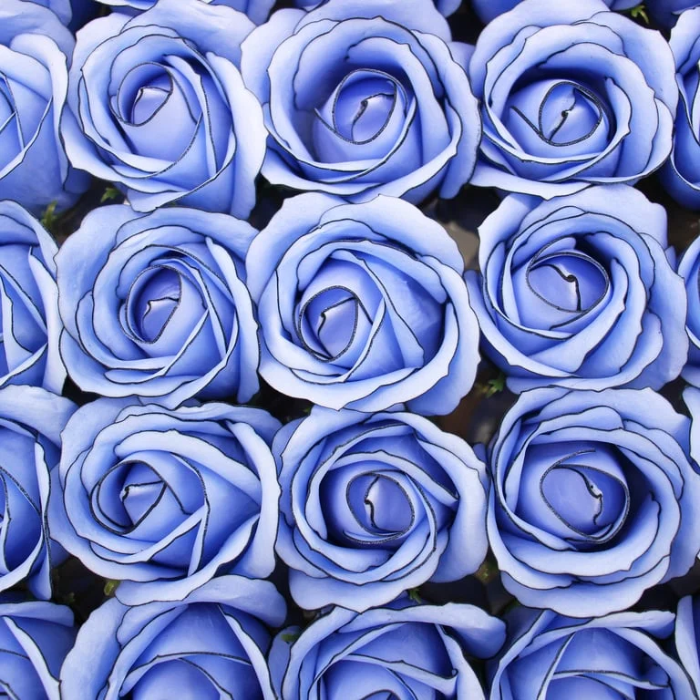 Medium-sized blue soap flower rose with black rim, crafted as a decorative soap.