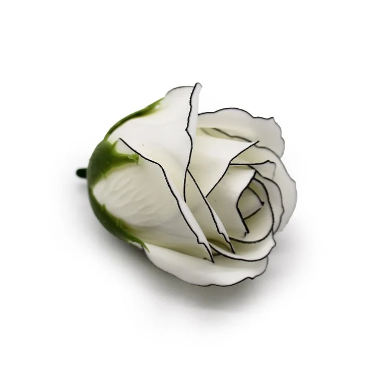 Craft soap flower in medium rose shape, ivory body with black rim.