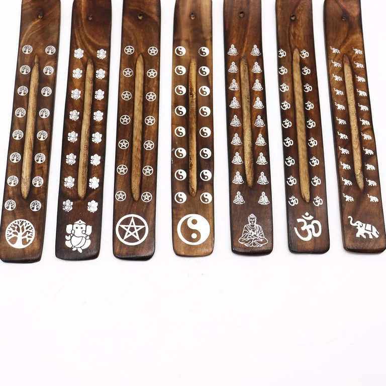 Carved ashcatcher made from mango wood showcasing a burnt finish.