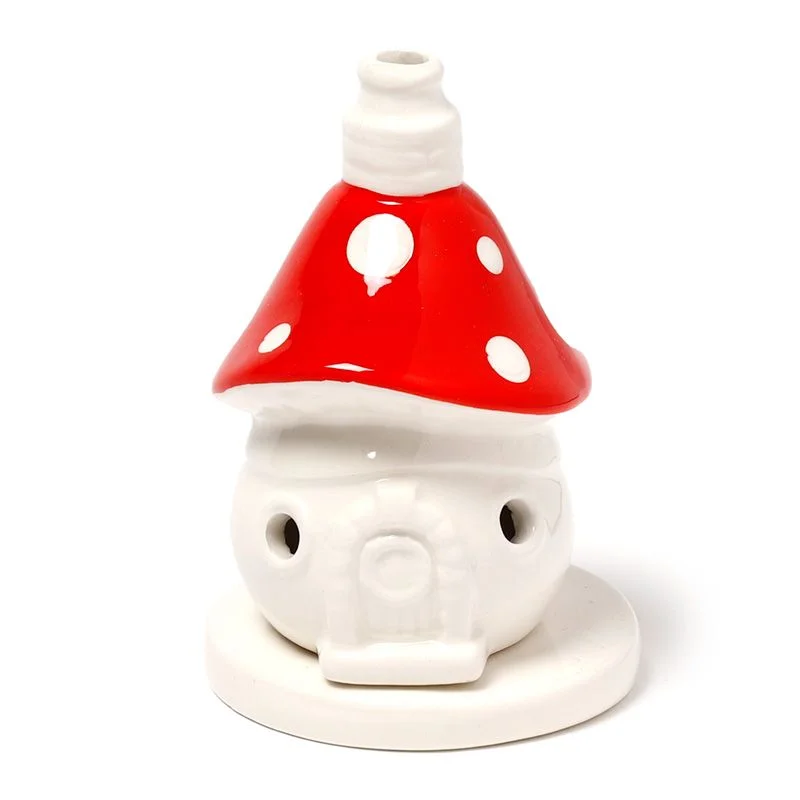 Ceramic cone incense holder shaped like a fairy toadstool house with detailed roof and small windows on white background