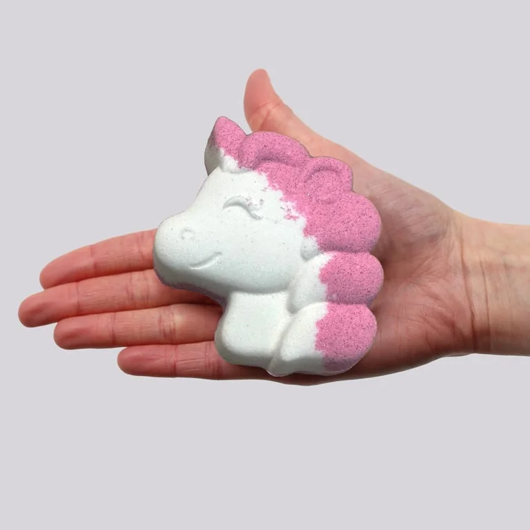 Unicorn-shaped colorful bath bomb weighing 100g for bath bombs UK collection on white background