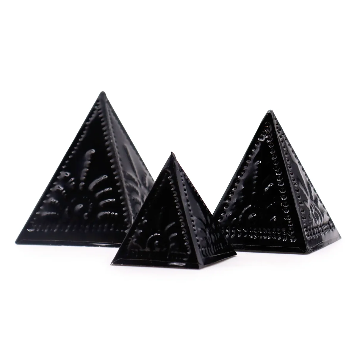 Black incense mould set showing multiple shapes for creating incense powder designs on a white background
