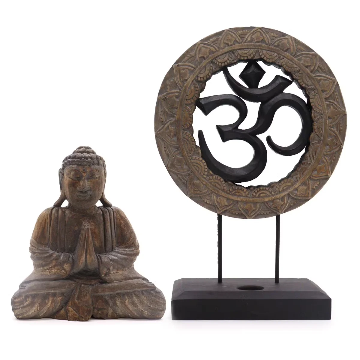 Grey and black figurine of Buddha with Om symbol, part of a Feng Shui set, in calming grey and black tones