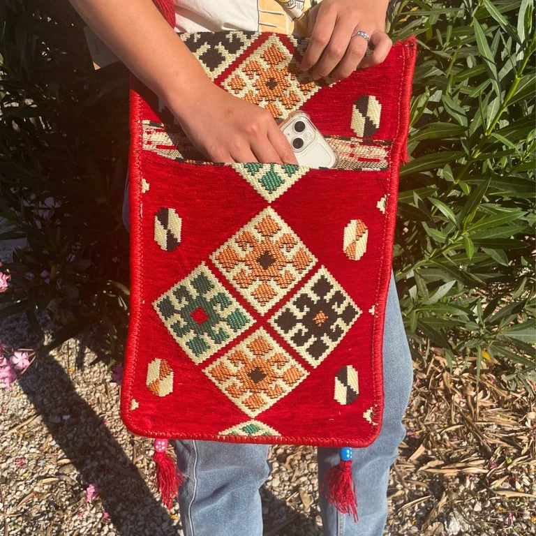Red kilim bag messenger style, bright woven red design, festival bag