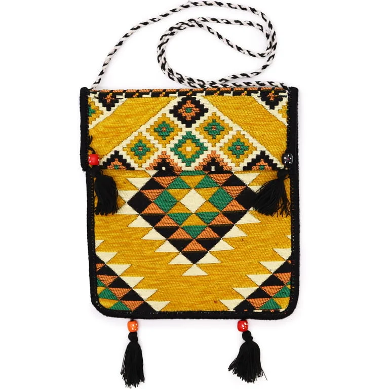 Yellow kilim messenger bag featuring vibrant Kilim pattern, open front, adjustable straps and cozy plush lining.