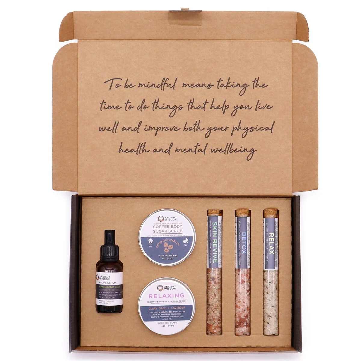 Mindful Moments self care kit with various wellness items arranged neatly on a white background