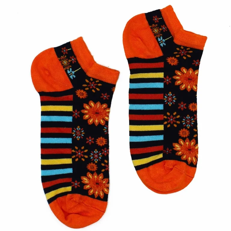 Close‑up of mid‑length bamboo socks featuring a mandala flower design.