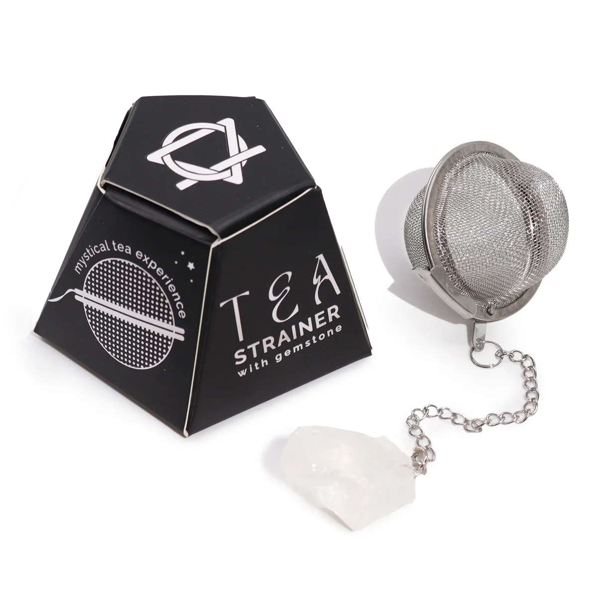 Raw rock quartz gemstone tea infuser with metal strainer and handle on white background