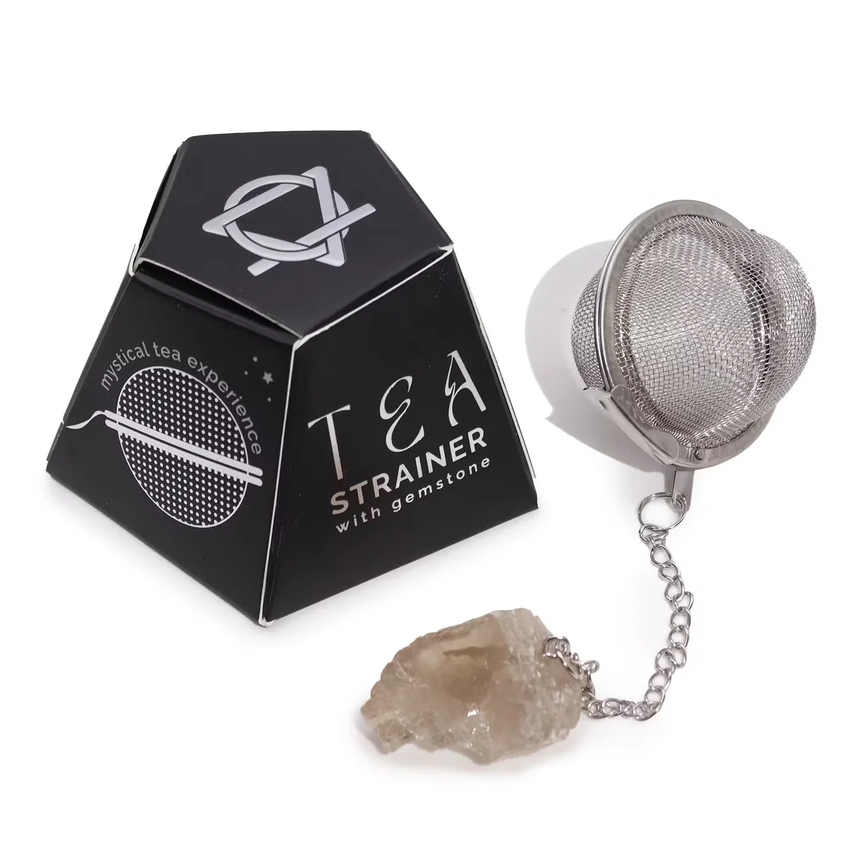 Raw smoky quartz crystal tea strainer with metal mesh, showcasing unique tea accessories for brewing loose leaf tea