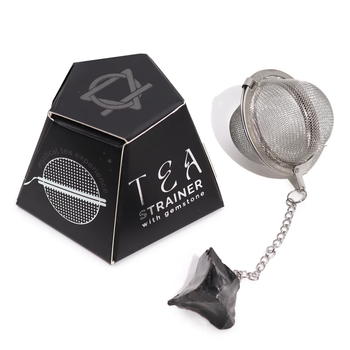 Black obsidian raw crystal gemstone tea infuser with metal mesh strainer and handle on white background