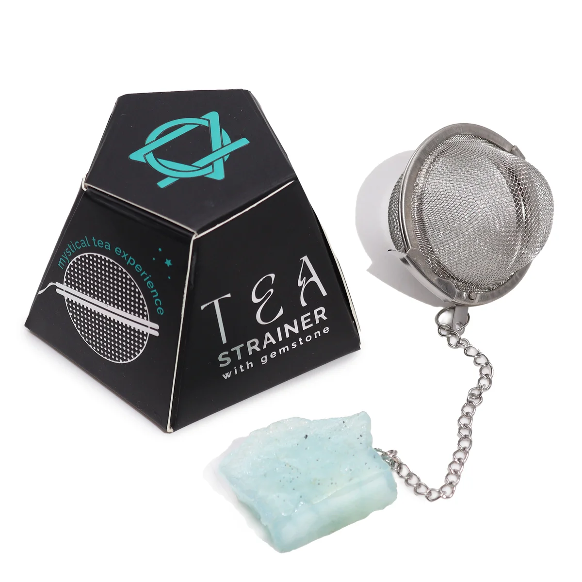 Raw aquamarine crystal gemstone tea infuser with metal strainer resting on a white background
